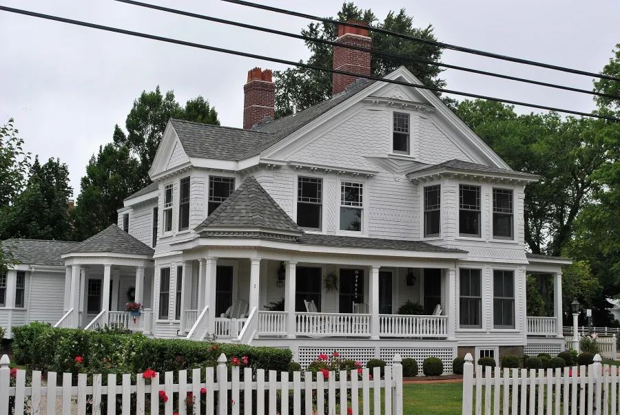 White wraparound-porch house in Falmouth